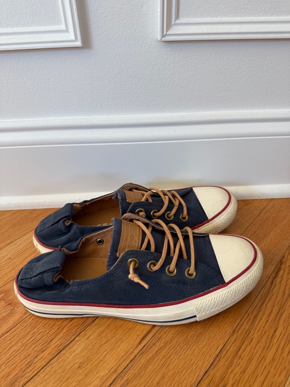 Converse women’s Navy Canvas Low-Top Sneakers with Tan Laces